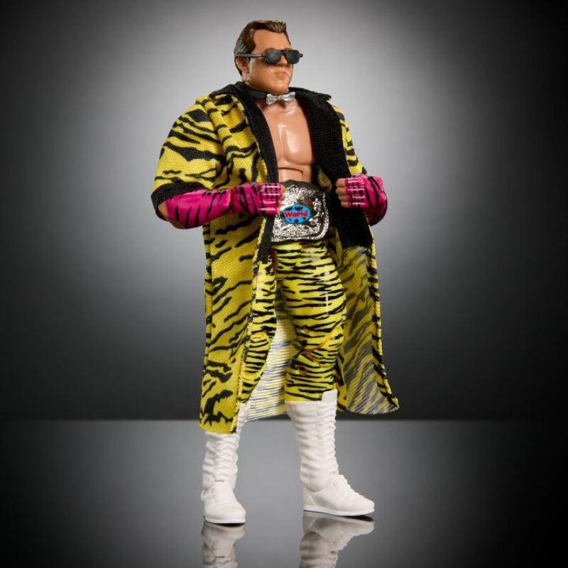 Mattel WWE Elite Action Figure & Accessories, 6-inch Collectible Brutus Beefcake with 25 Articulation Points, Life-Like Look & Swappable Hands